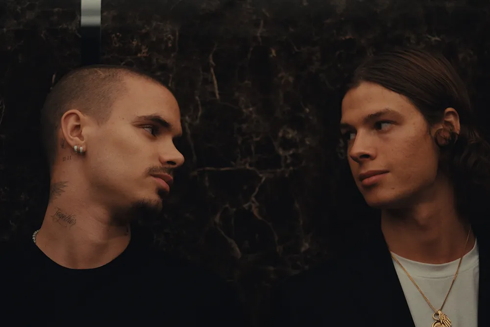 Meet the stars of the gay tennis romance serving up Heated Rivalry on ...