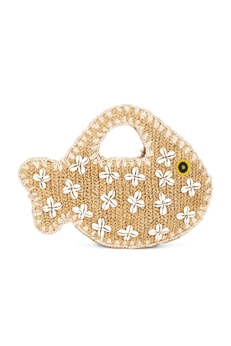 Fashion people keep carrying this bag with everything right now