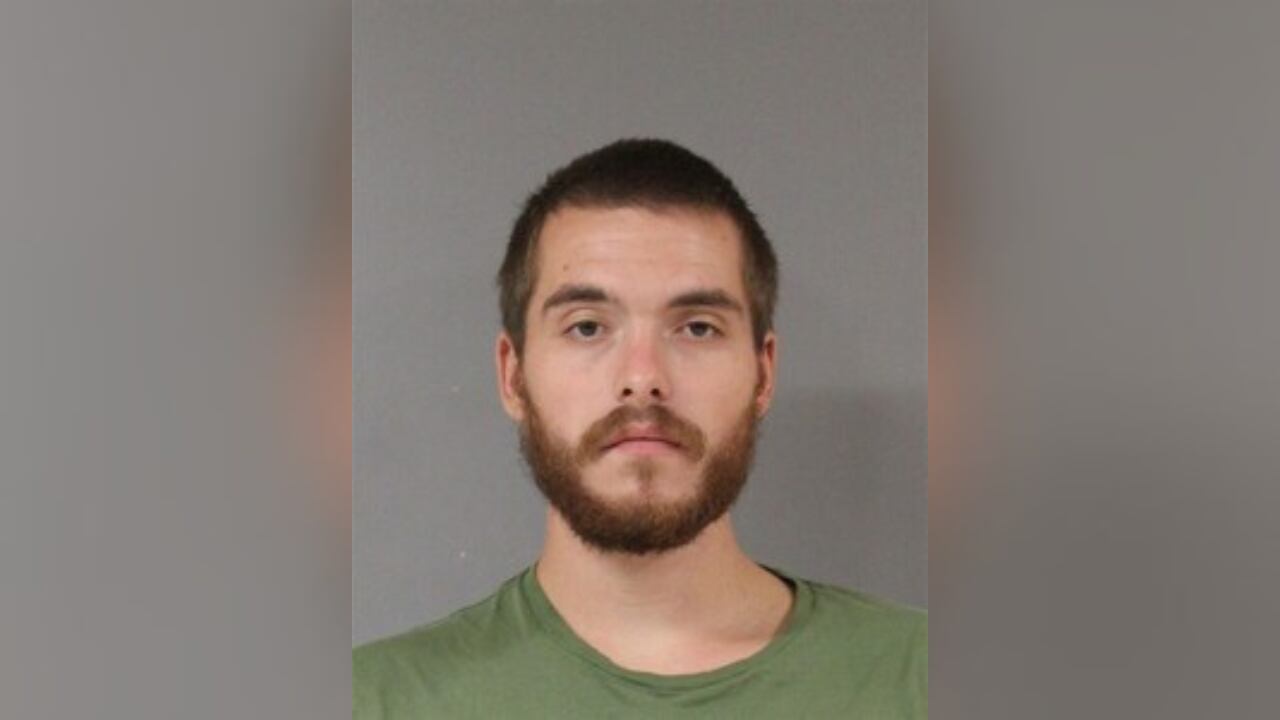 Man charged with attempted murder after allegedly attacking 2 with machete