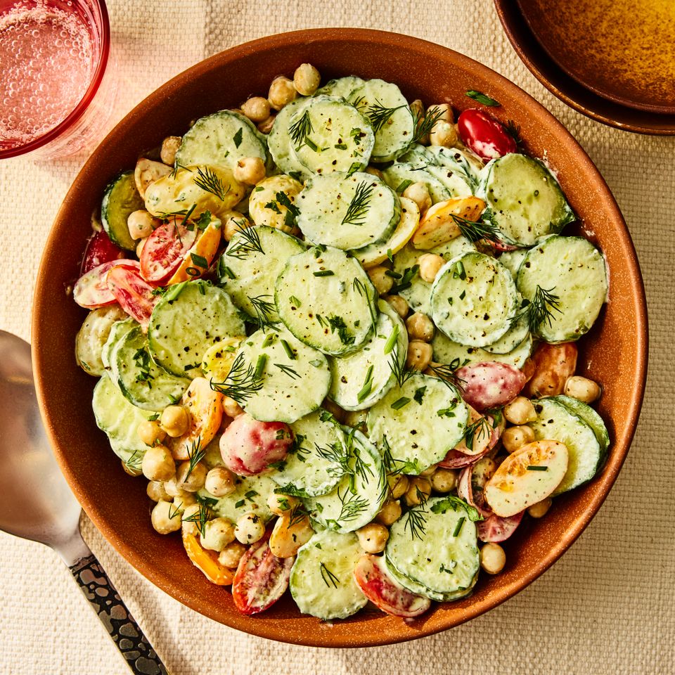A recipe image of High-Protein Creamy Cucumber-Tomato Salad with Feta & Chickpeas.