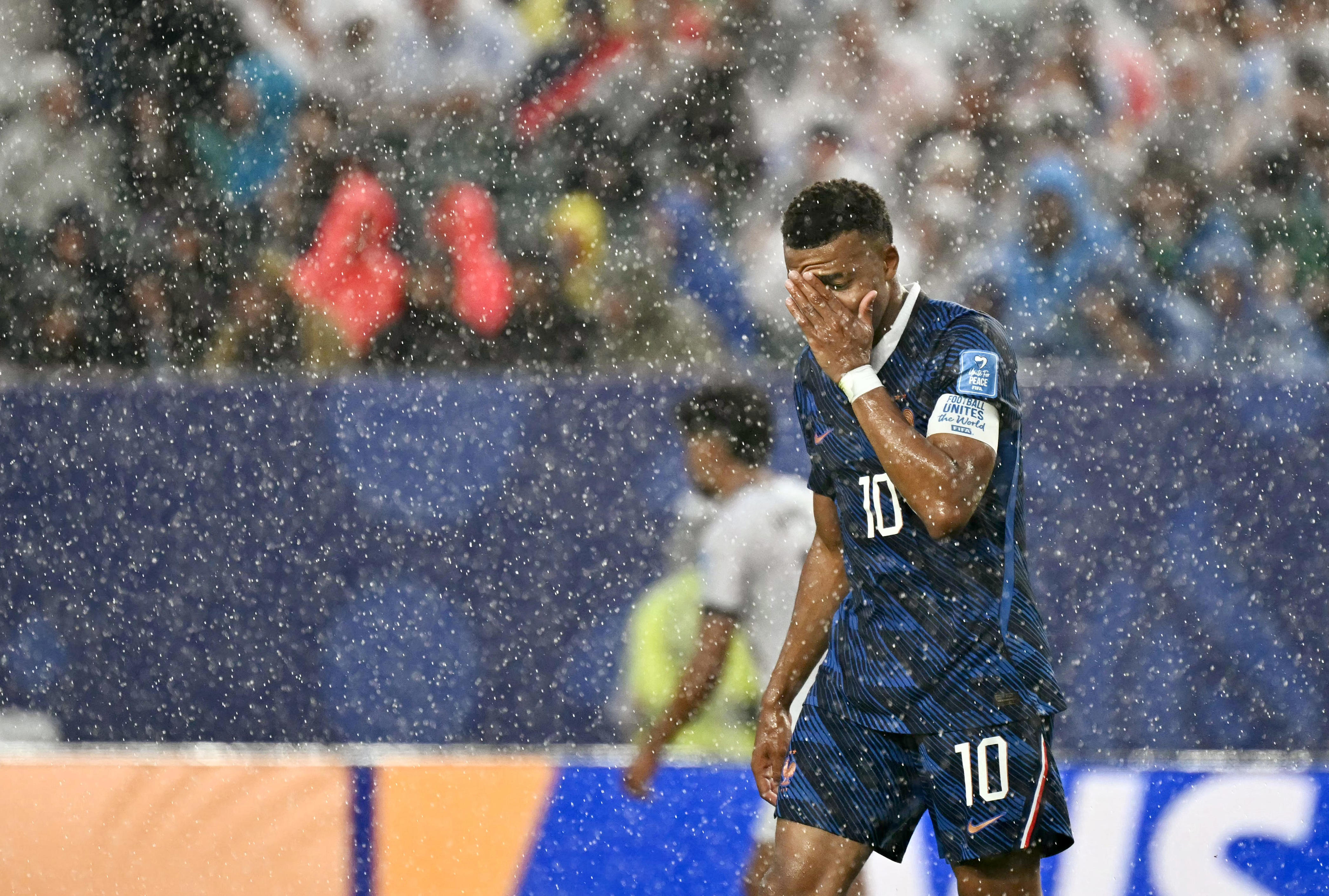 Heavy rain during France vs. Iraq made for incredible World Cup photos