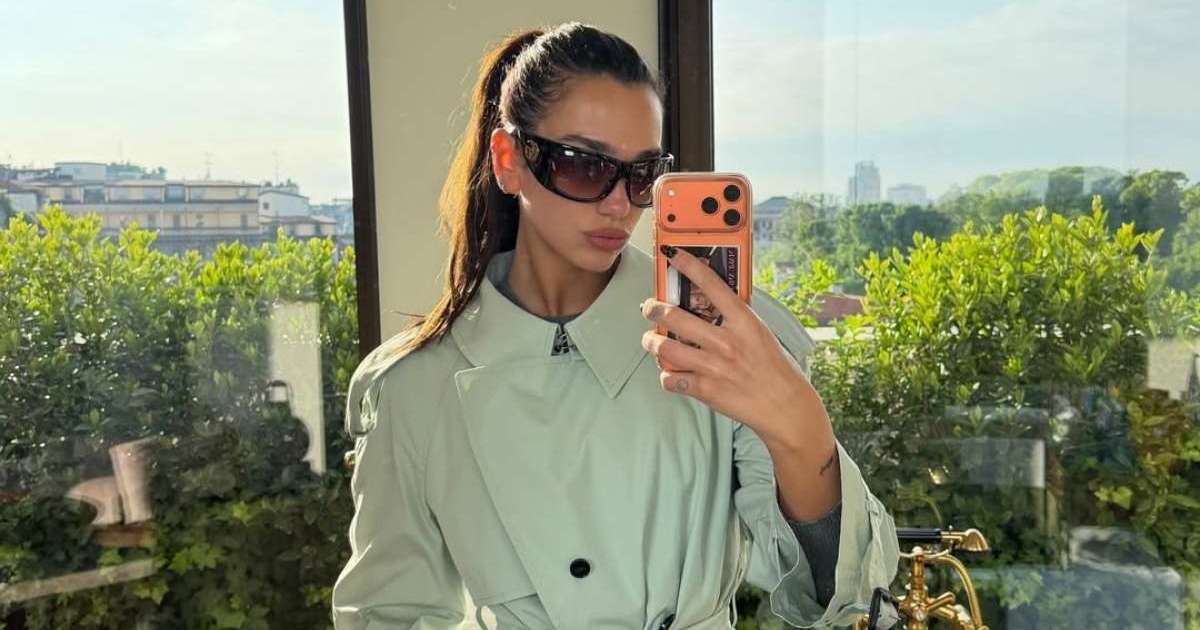 Dua Lipa wraps up honeymoon in plunging Courreges buckle-detail tank top