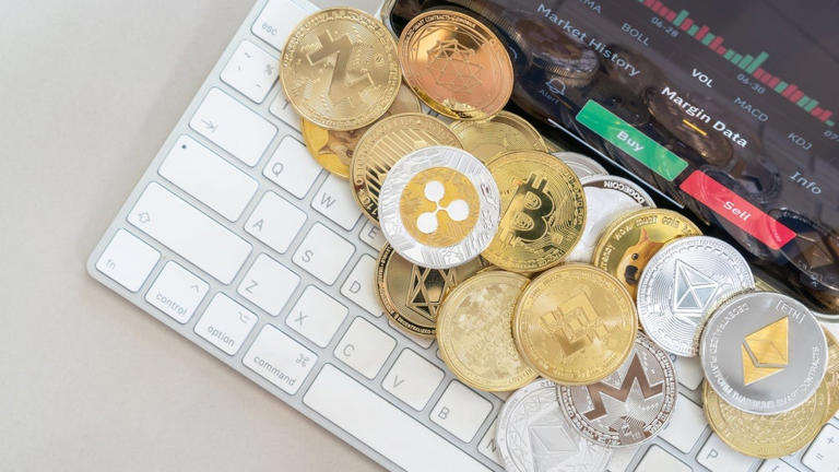Bitcoin hits $62,000, Ethereum, XRP, Dogecoin slide more than 4% as ...