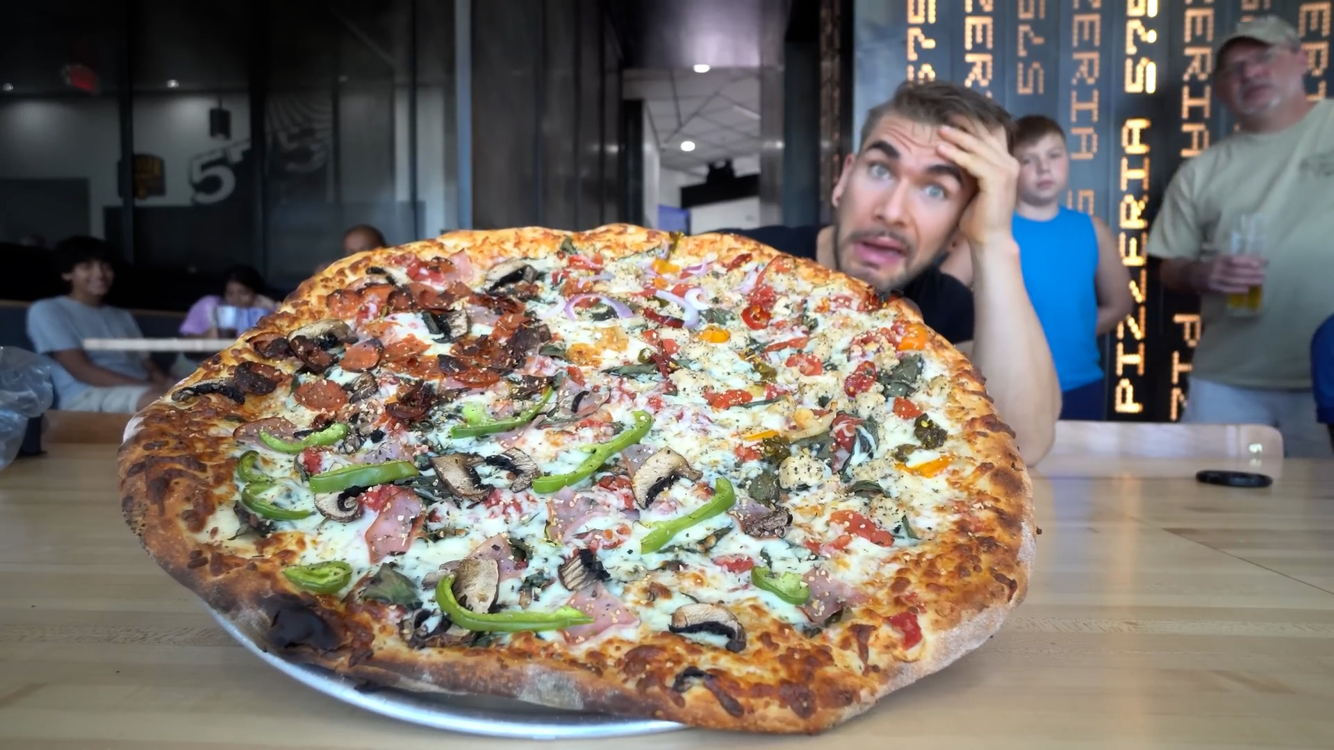 Man attempts undefeated monster pizza challenge loaded with 5 toppings