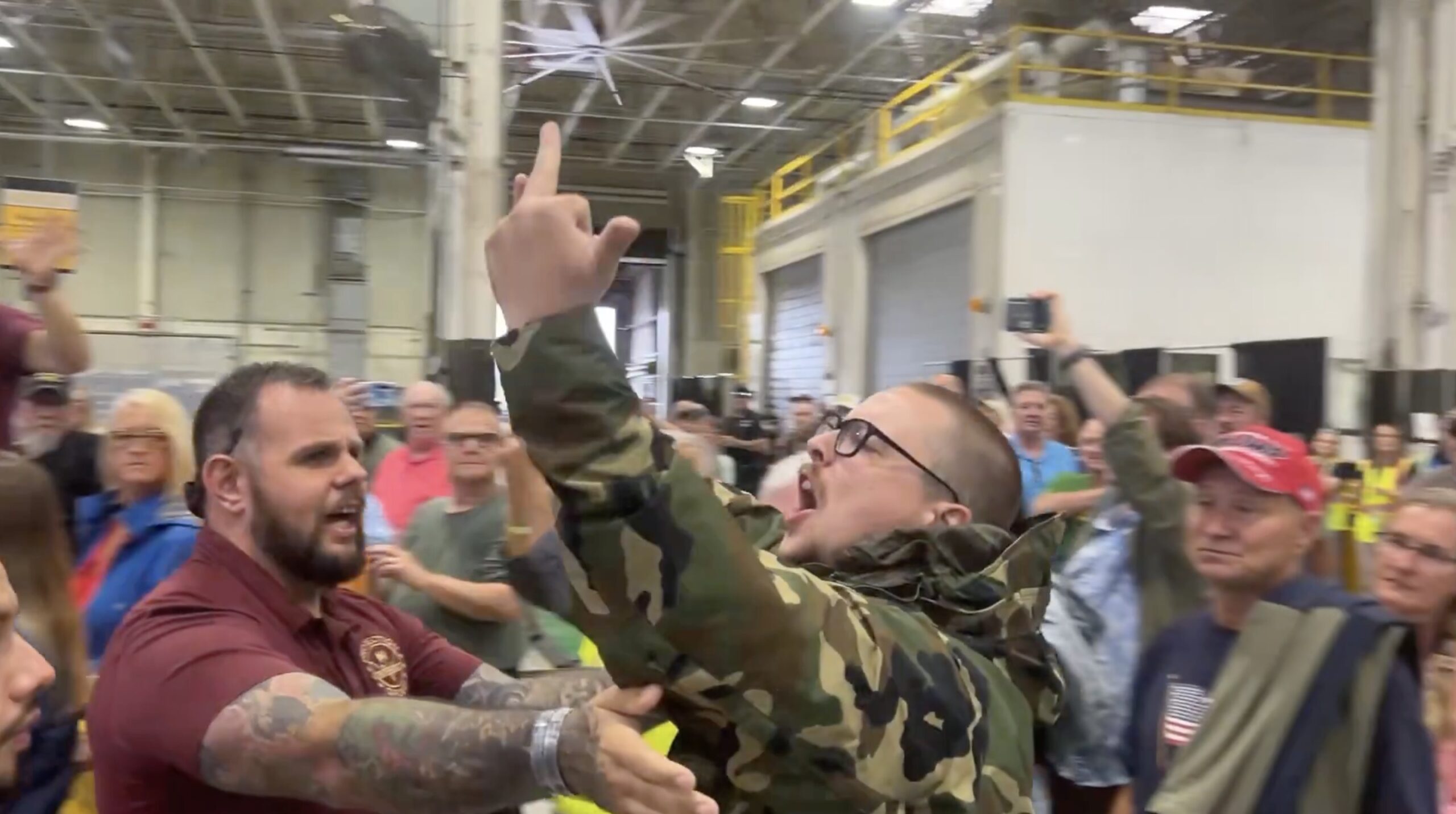 Protester escorted out of Trump rally in Pennsylvania flipping the bird ...