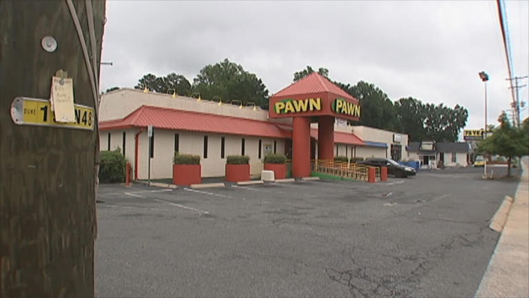 3 charged with murder 9 years after pawn shop shooting