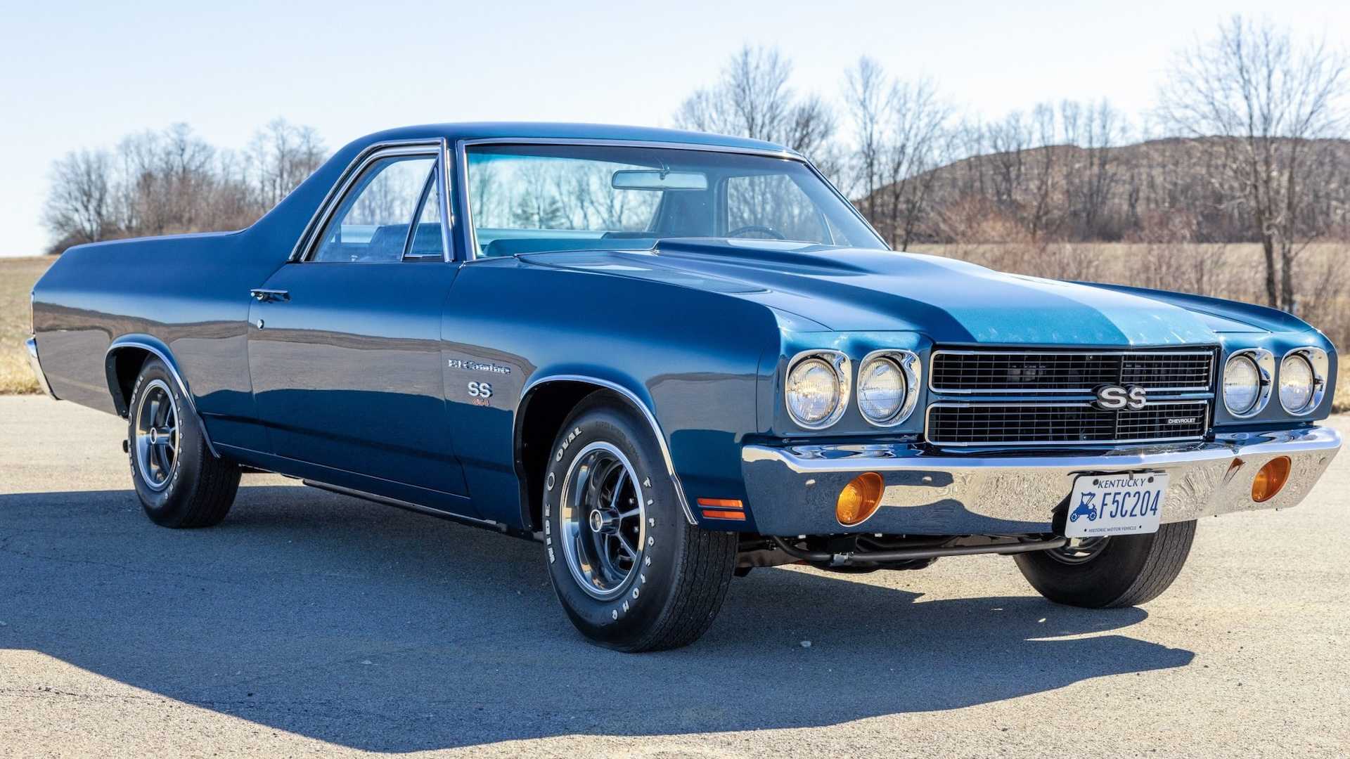 The front grill and fender of a 1970s muscle truck.