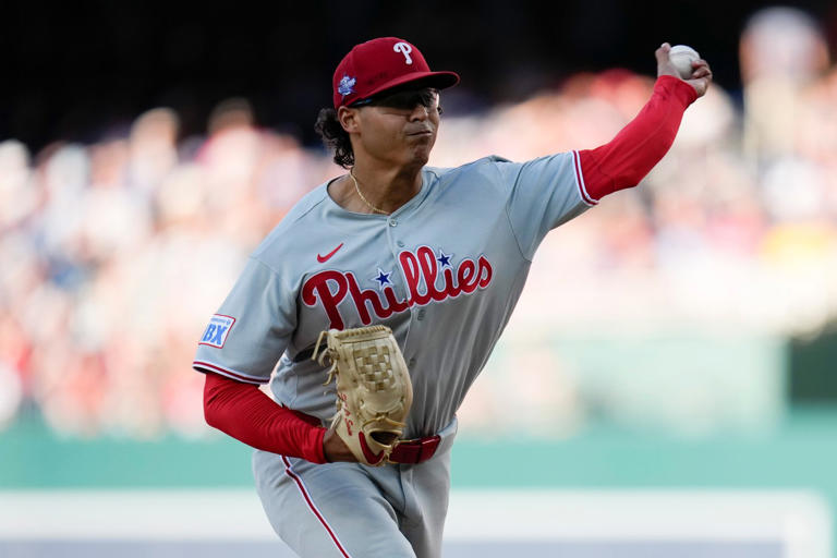 Phillies score 8 runs in the ninth inning and rally past the Nationals 14-9