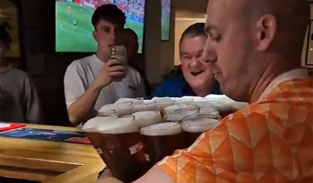 Dutch daredevil goes viral after carrying 26 pints without a tray