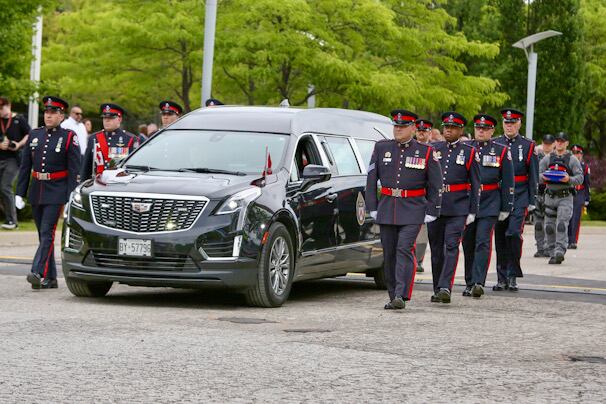 Family, Toronto police officers honour Const. Marc Pinizzoto, who was ...