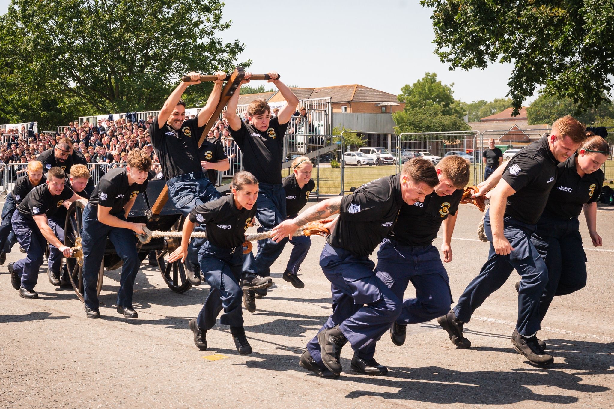 Scorching 35C weather doesn't stop Royal Navy sailors pushing large ...