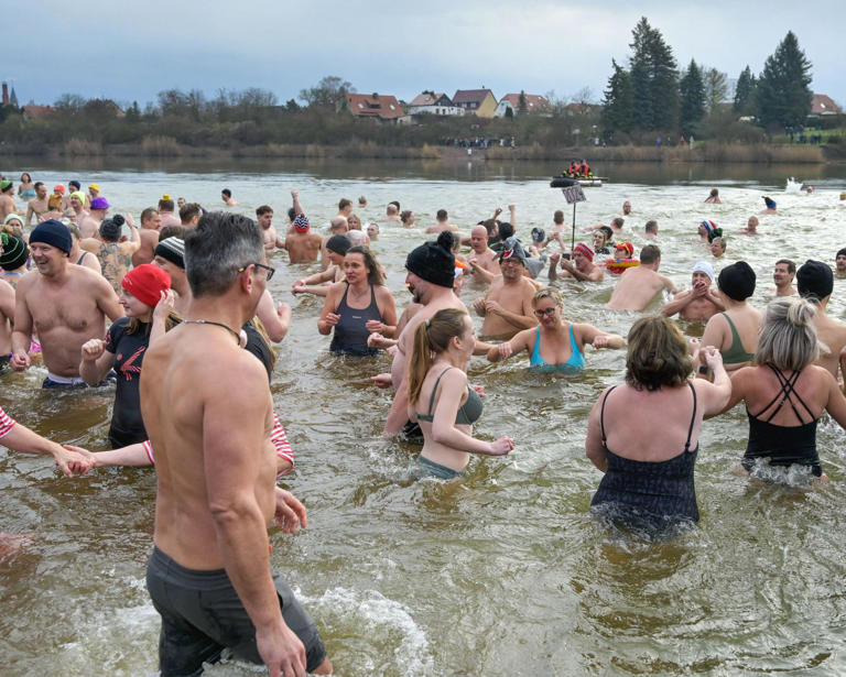 The Heidesee new year swim in 2024. Critics say the ban on non-German speakers dresses up ‘a blanket entry barrier for entire population groups’ as a safety precaution. Photograph: Dpa Picture Alliance/Alamy