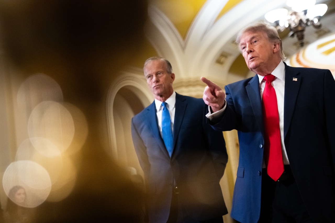 Senate Majority Leader John Thune and Trump at the Capitol Hill press conference.