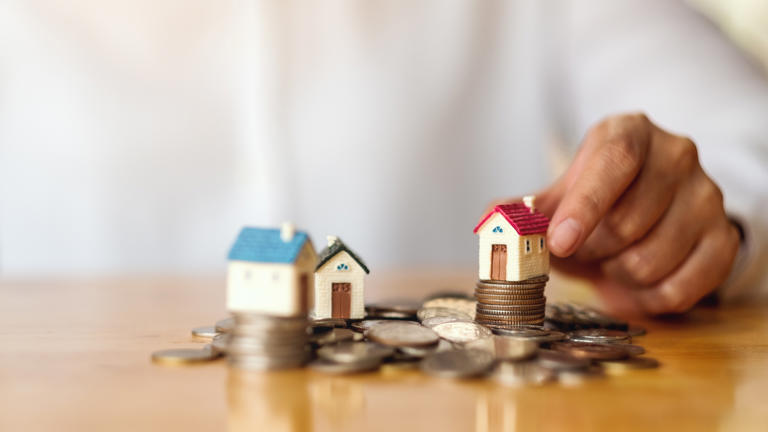 Homebuilder, real estate, mortgage stocks climb after housing bill passes