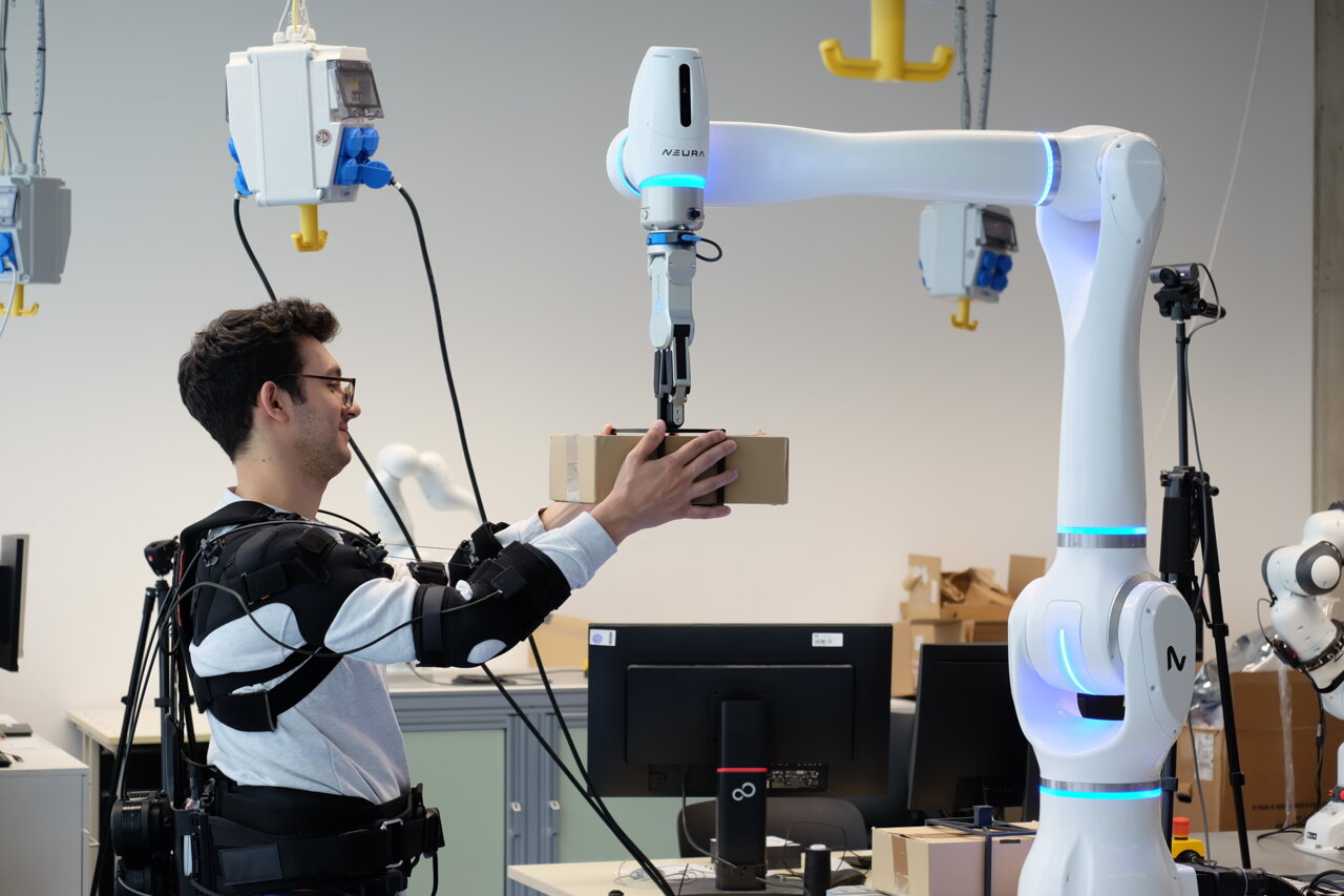 Exoskeleton and robotic arm reduce factory lifting strain by up to 65%