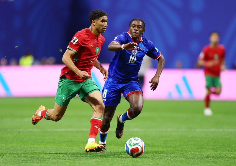 soccer-morocco-earn-comeback-win-over-haiti-to-reach-last-32-as-group