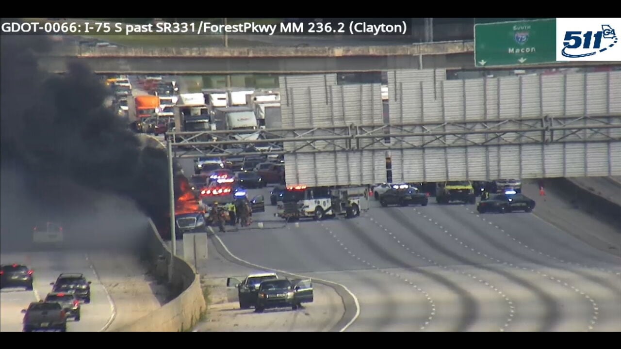 Some I-75 lanes reopen in Clayton County as car carrier catches fire