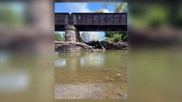 Firefighters extinguish 'significant debris fire' under area railroad ...