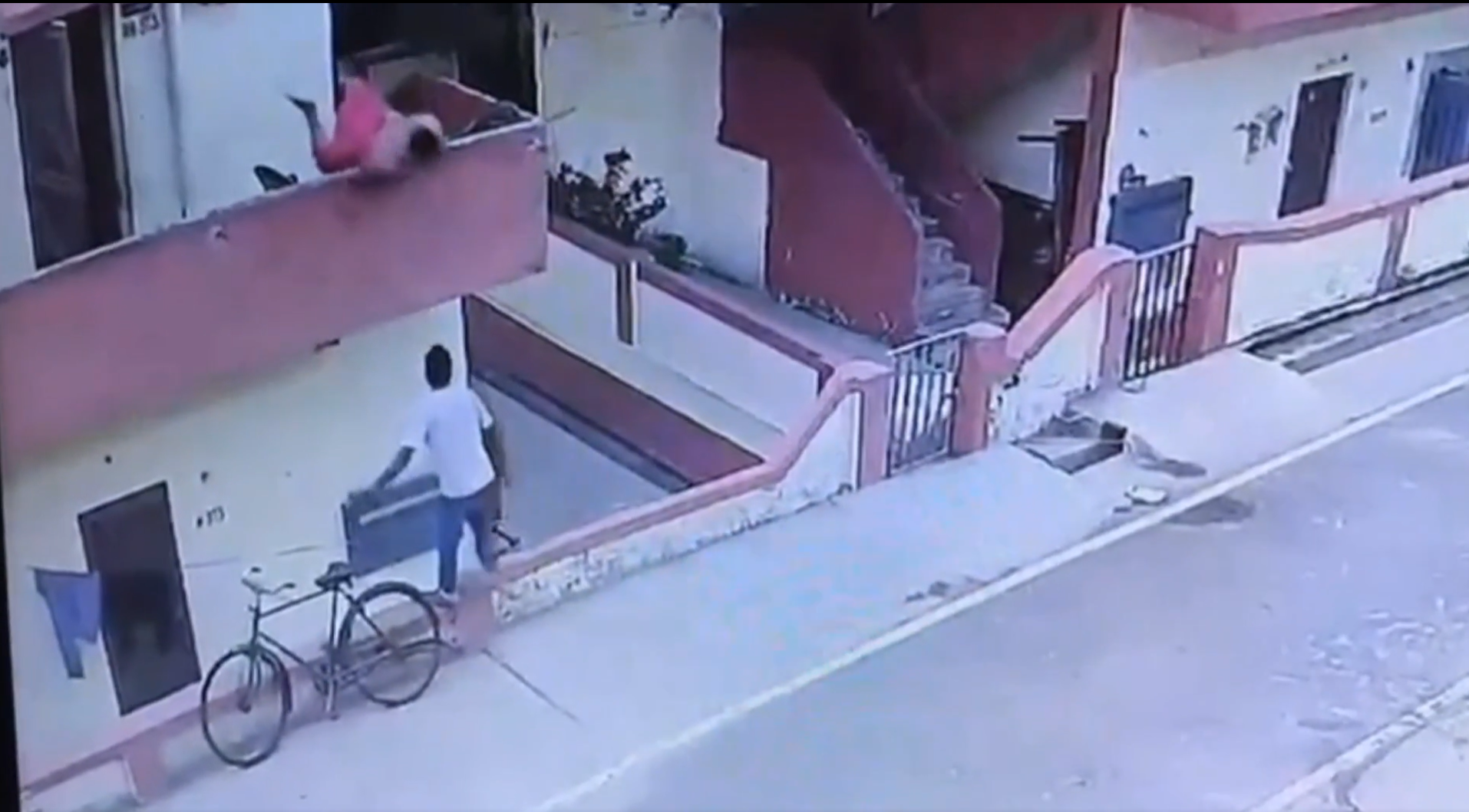 Watch video: Man injured after falling from balcony while reaching for ...