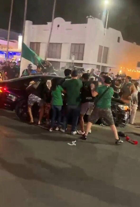 Terrifying moment car ploughs into crowd of World Cup fans on busy street