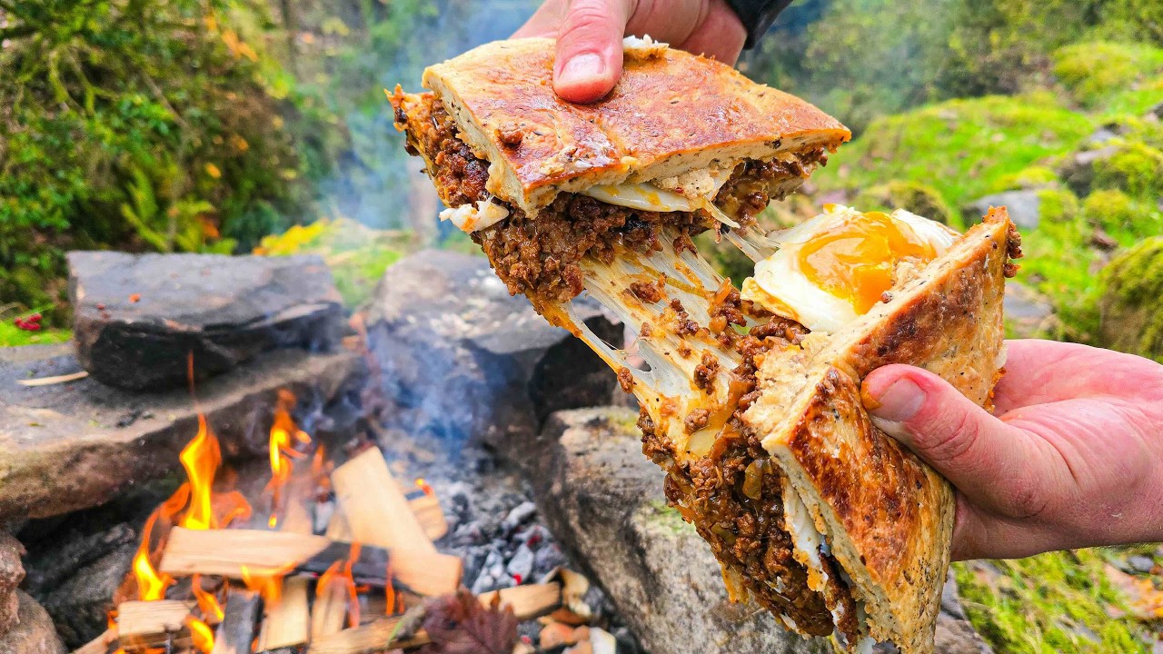 Watch how this juicy beef and pork cheese melt comes together over fire