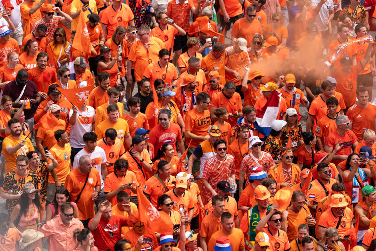 Dutch fans take over Kansas City streets to cheer on the Netherlands