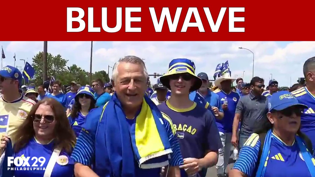 Blue wave of Curaçao fans march to Philadelphia Stadium