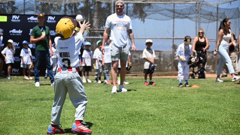 Young athletes take the field for baseball camp with extra special ...