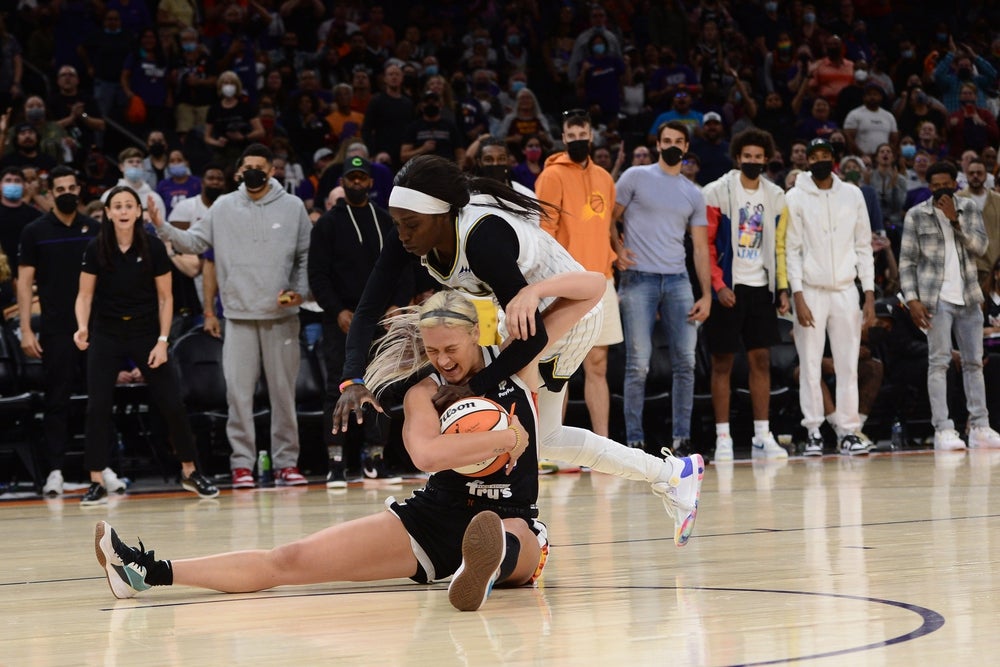 Oct 13, 2021; Phoenix, Arizona, USA; Chicago Sky guard/forward Kahleah Copper (2) fouls Phoenix Mercury guard Sophie Cunningham (9) during the first half of game two of the 2021 WNBA Finals at Footprint Center. Mandatory Credit: Joe Camporeale-Imagn Images