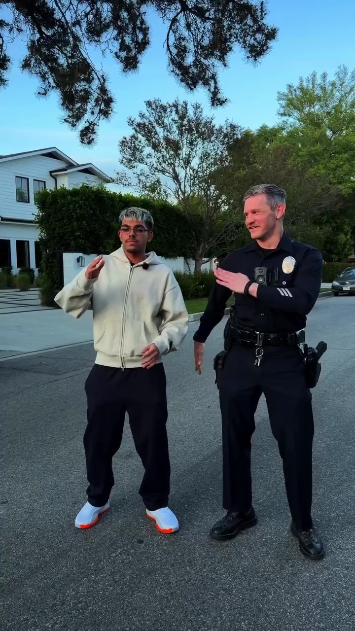 Extraordinary moment OnlyFans actors dance with cops at notorious