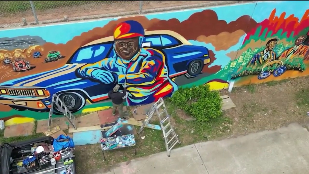 Atlanta artist paints massive World Cup mural in West Midtown