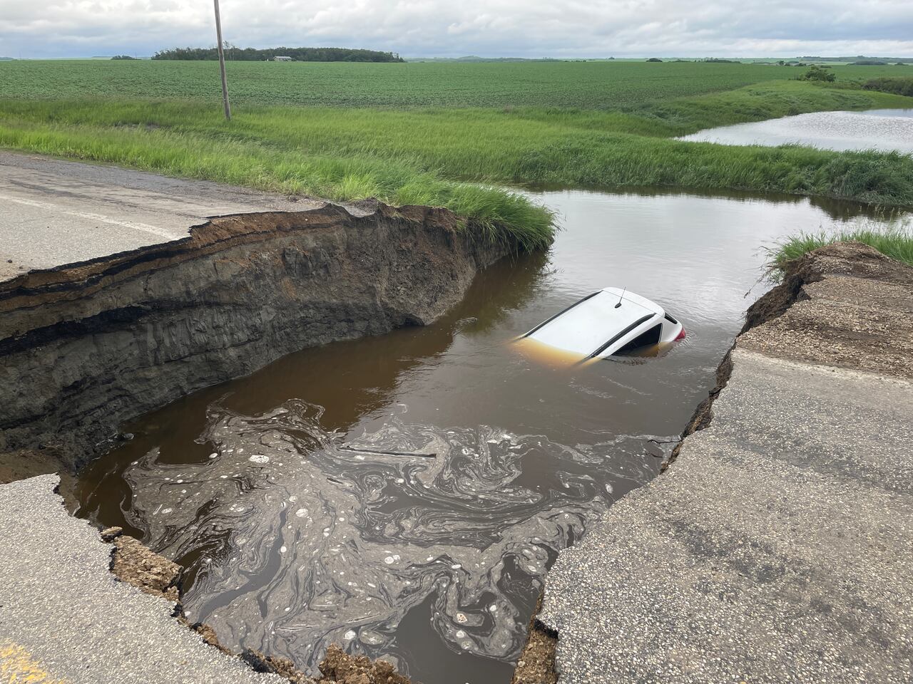Heavy rainfall washes out roads, floods towns in east-central Sask.