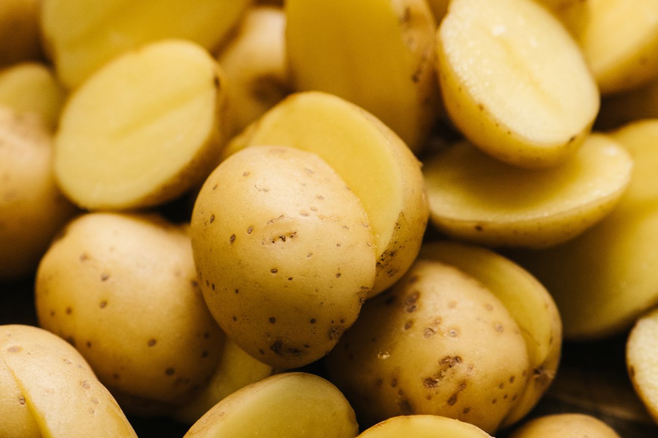 Sliced potatoes on a surface