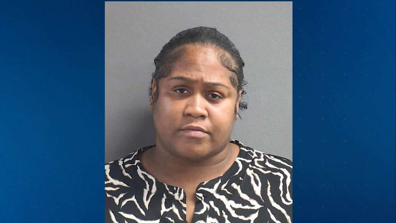 Mother accused of leaving child in hot car jailed on new charge
