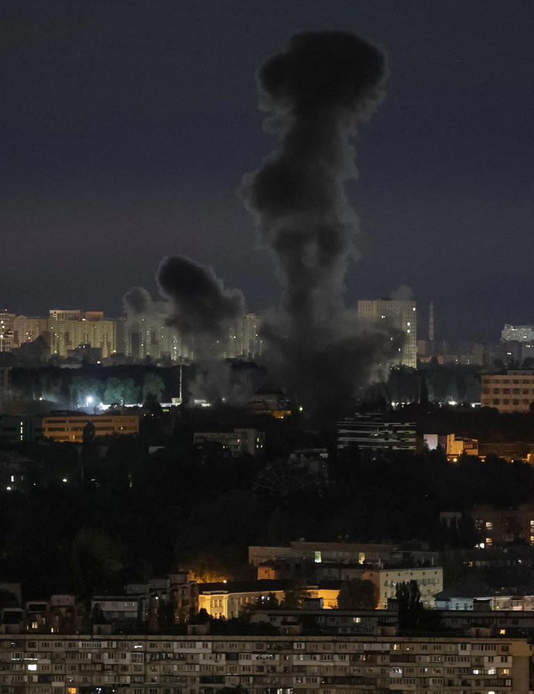 Smoke rises from a military site following a drone and missile strike in the region.