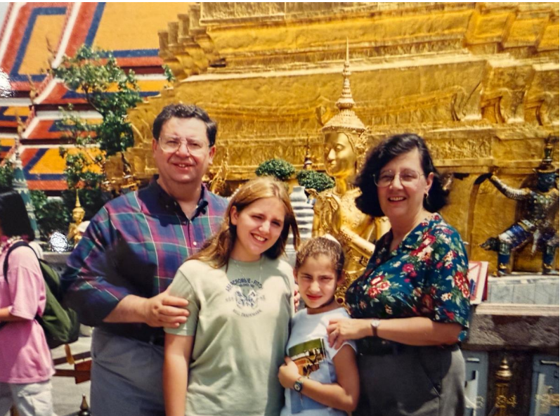 The Pennas with daughters in Thailand in 2009.