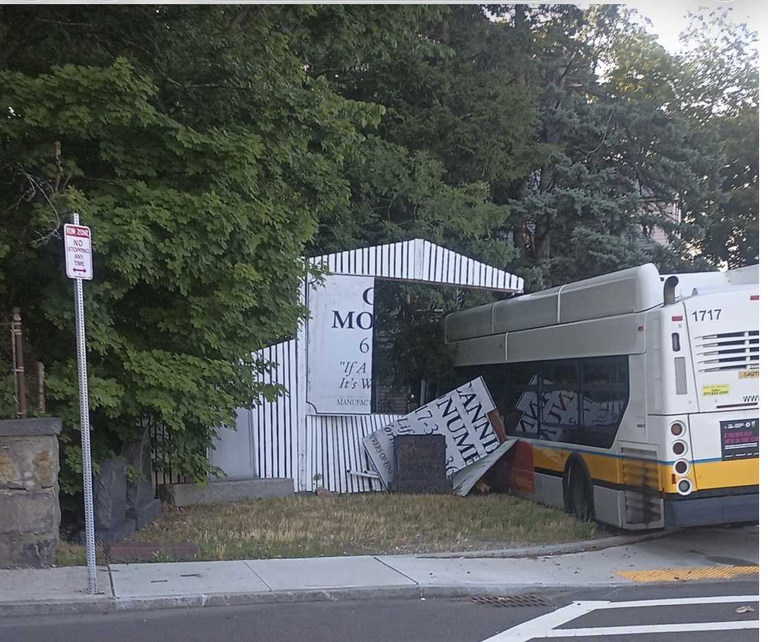 Driver, passenger injured when MBTA bus strikes fence, tree in Boston