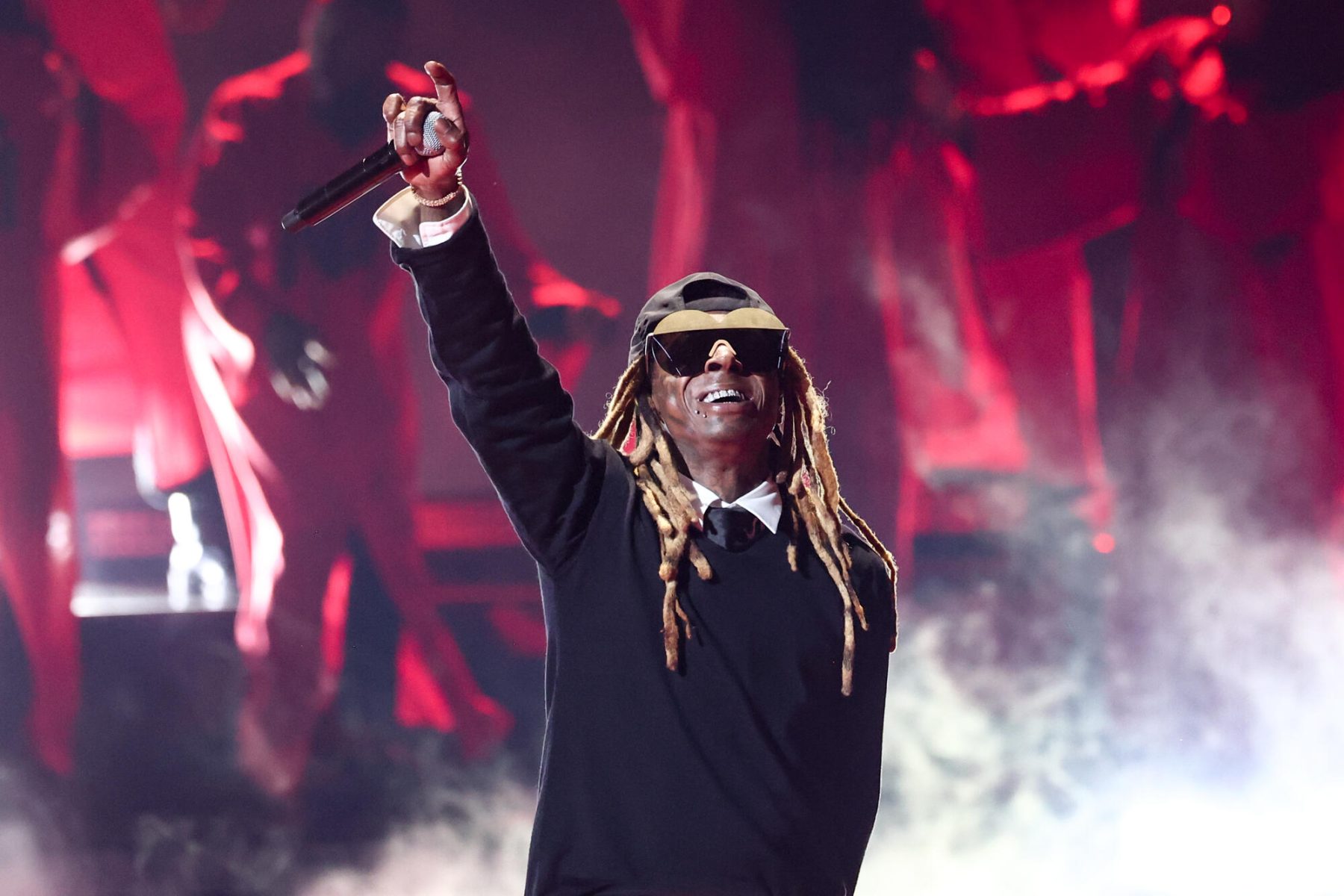 Lil Wayne reveals favorite rappers, aliens & why he hates milk