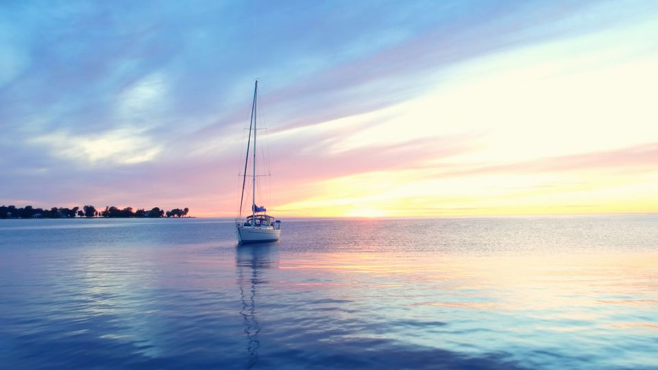 A sailboat drifts through the bucolic bay at Egg Harbor in Door Peninsula, which is rich in state and county parks. - Neos Des/Moment RF/Getty Images