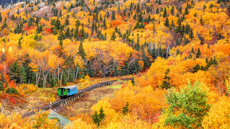 A cog railway train on Mount Washington in New Hampshire is on many a leaf peeper's itinerary. - DenisTangneyJr/E+/Getty Images