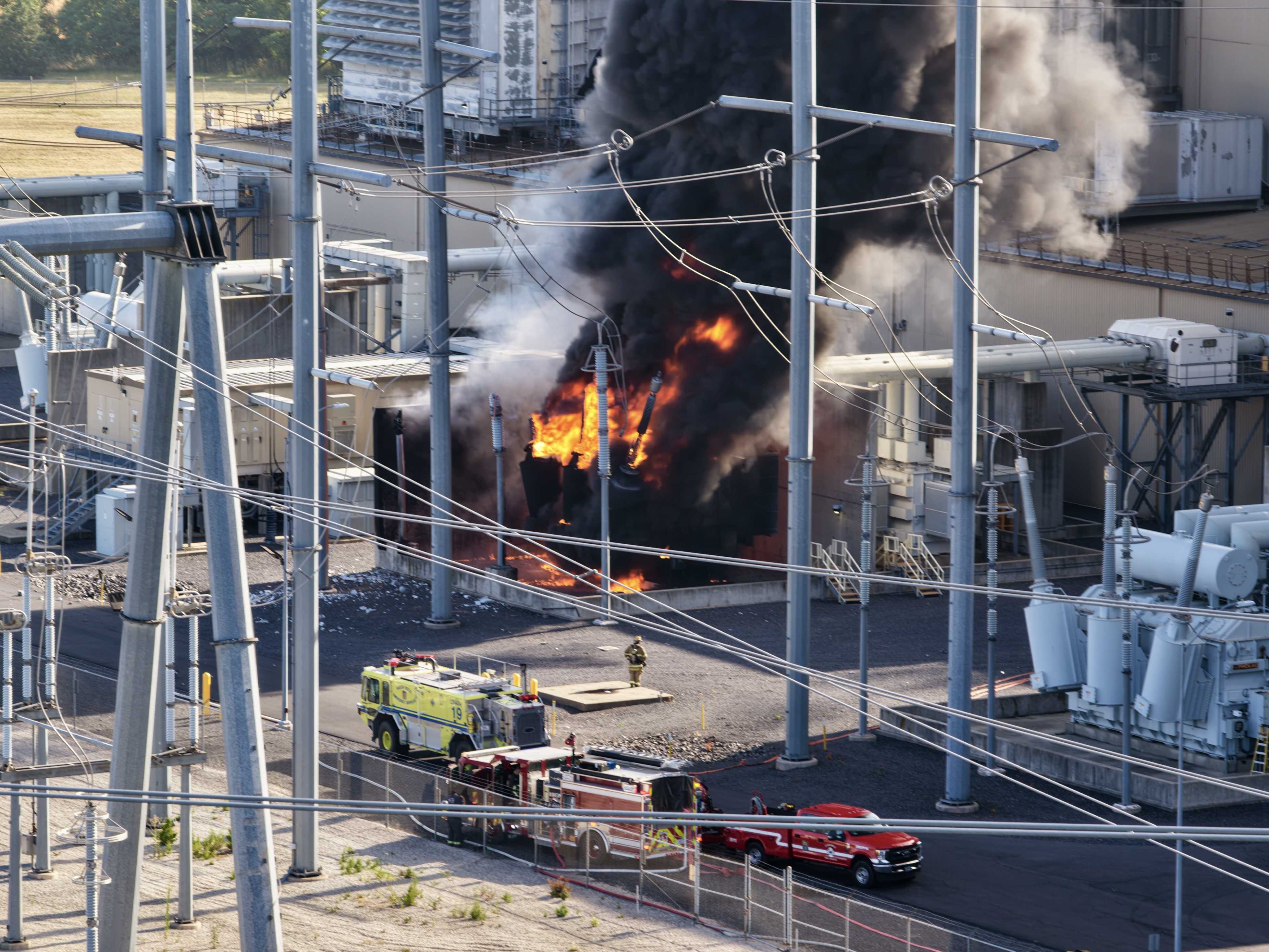 Huge column of black smoke billows from power plant; dozens of crews on ...