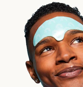 Person with a soothing forehead patch
