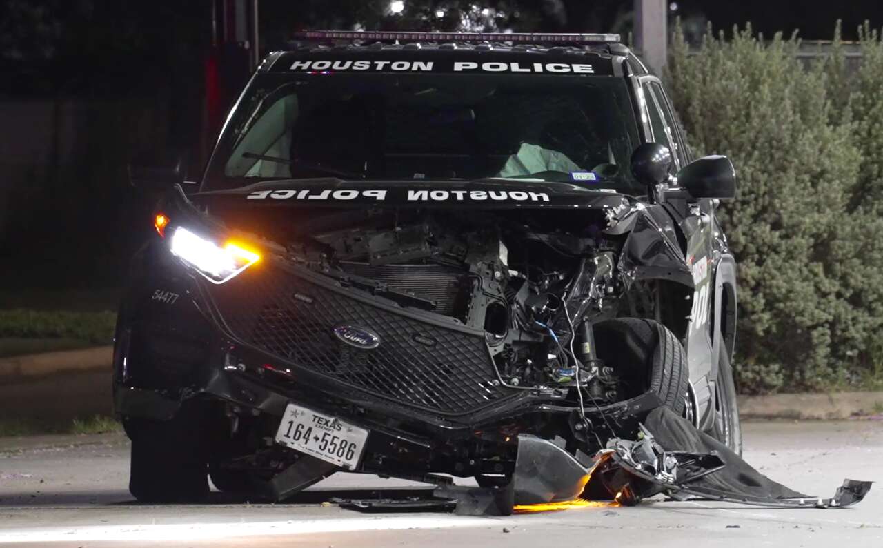 Houston police officer injured in crash at Clay and Gessner during ...