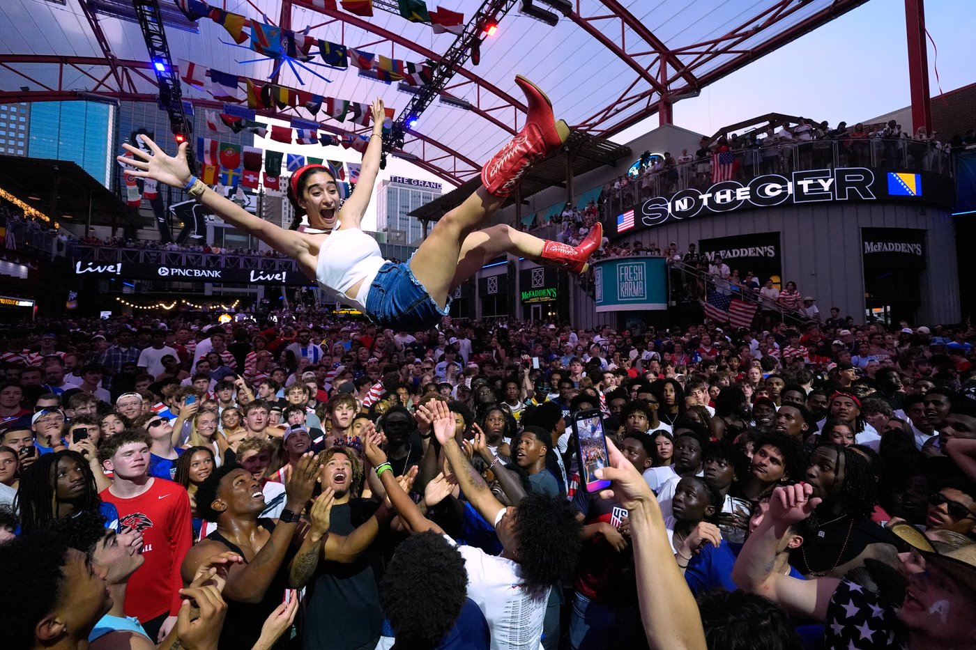 One extraordinary photo: Fan goes airborne to celebrate US win