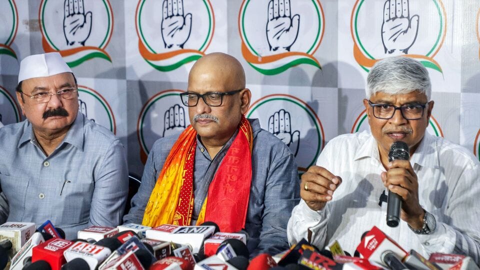 Lucknow, Jul 02 (ANI): Newly appointed state in-charge of UP congress Rajendra Pal Gautam with party's state president Ajay Rai address a press conference at party office, in Lucknow on Thursday. (ANI Photo)