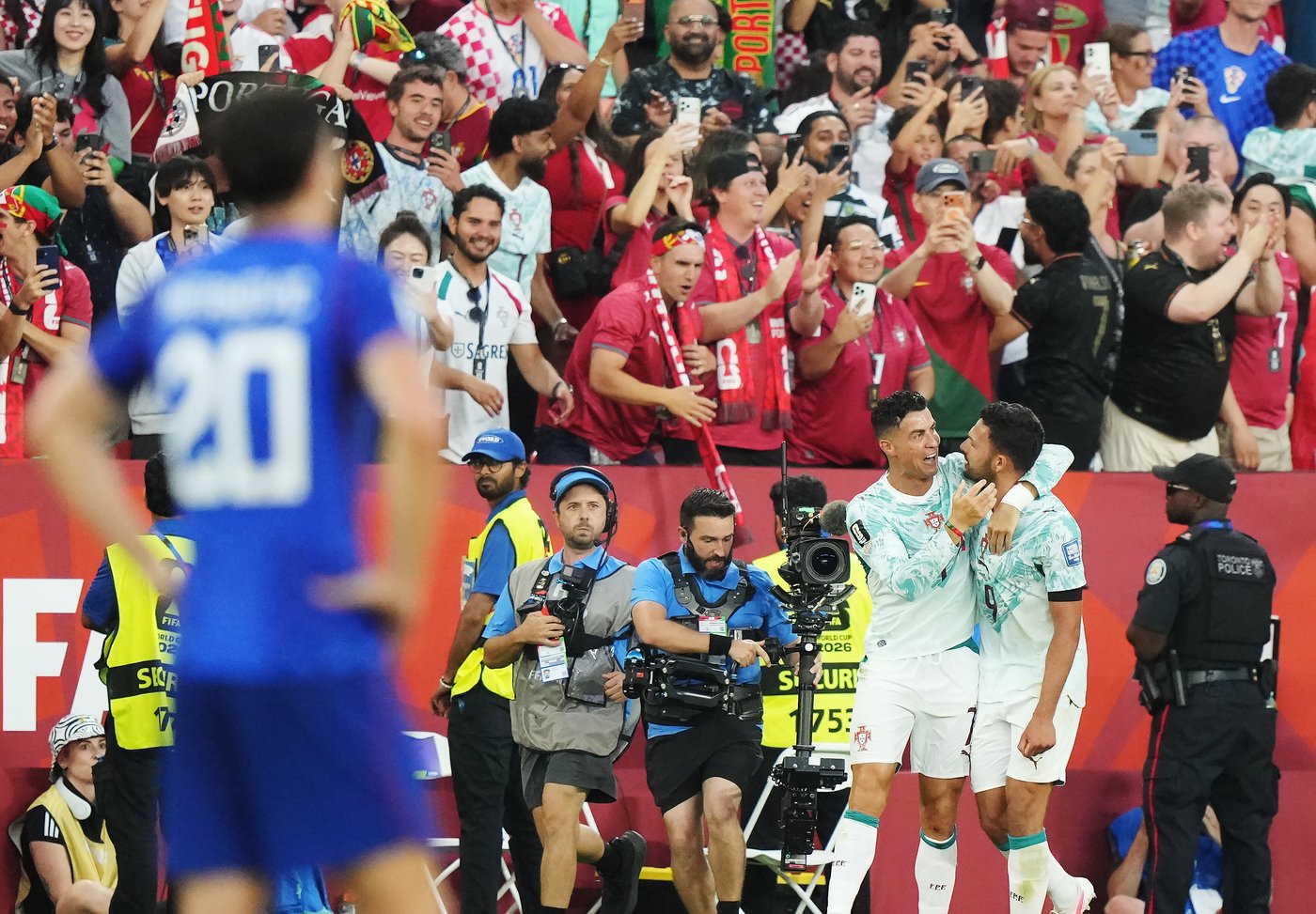 Portugal fans celebrate victory against Croatia in Toronto's last World ...