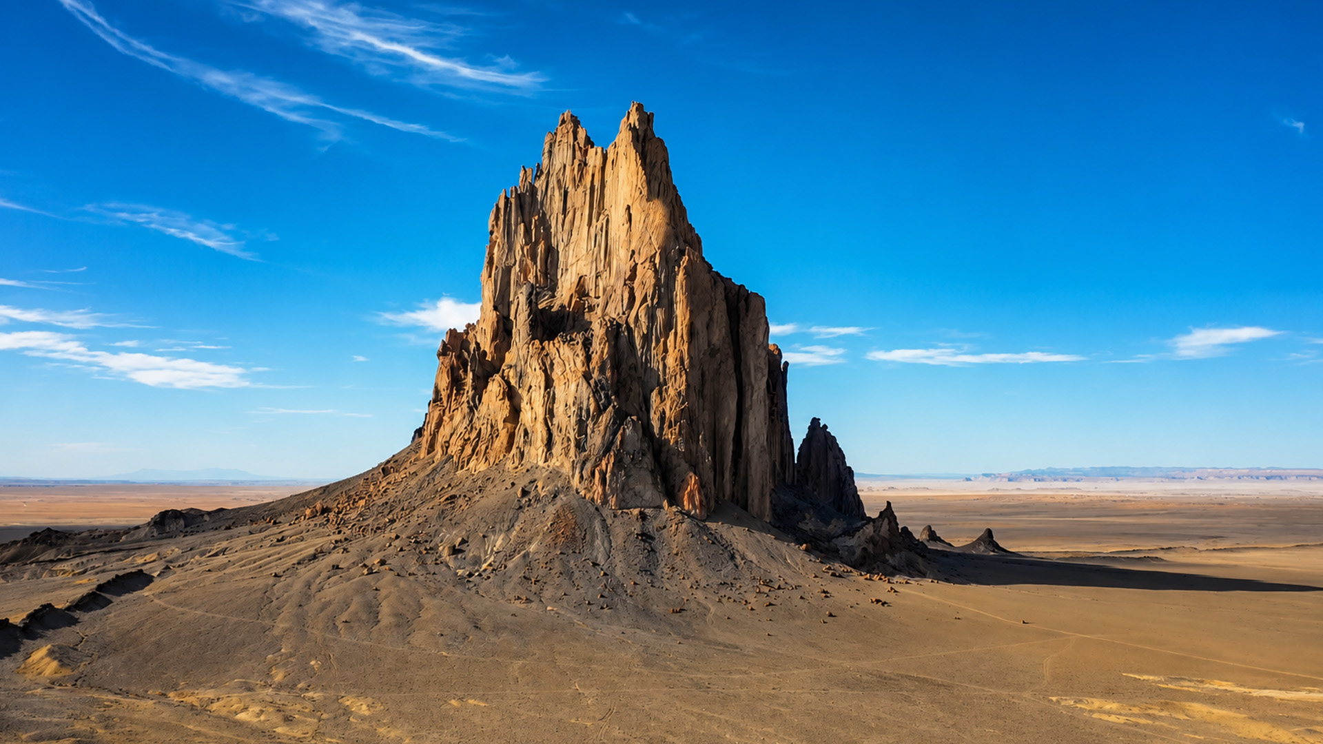 How did this massive rock rise from the desert?