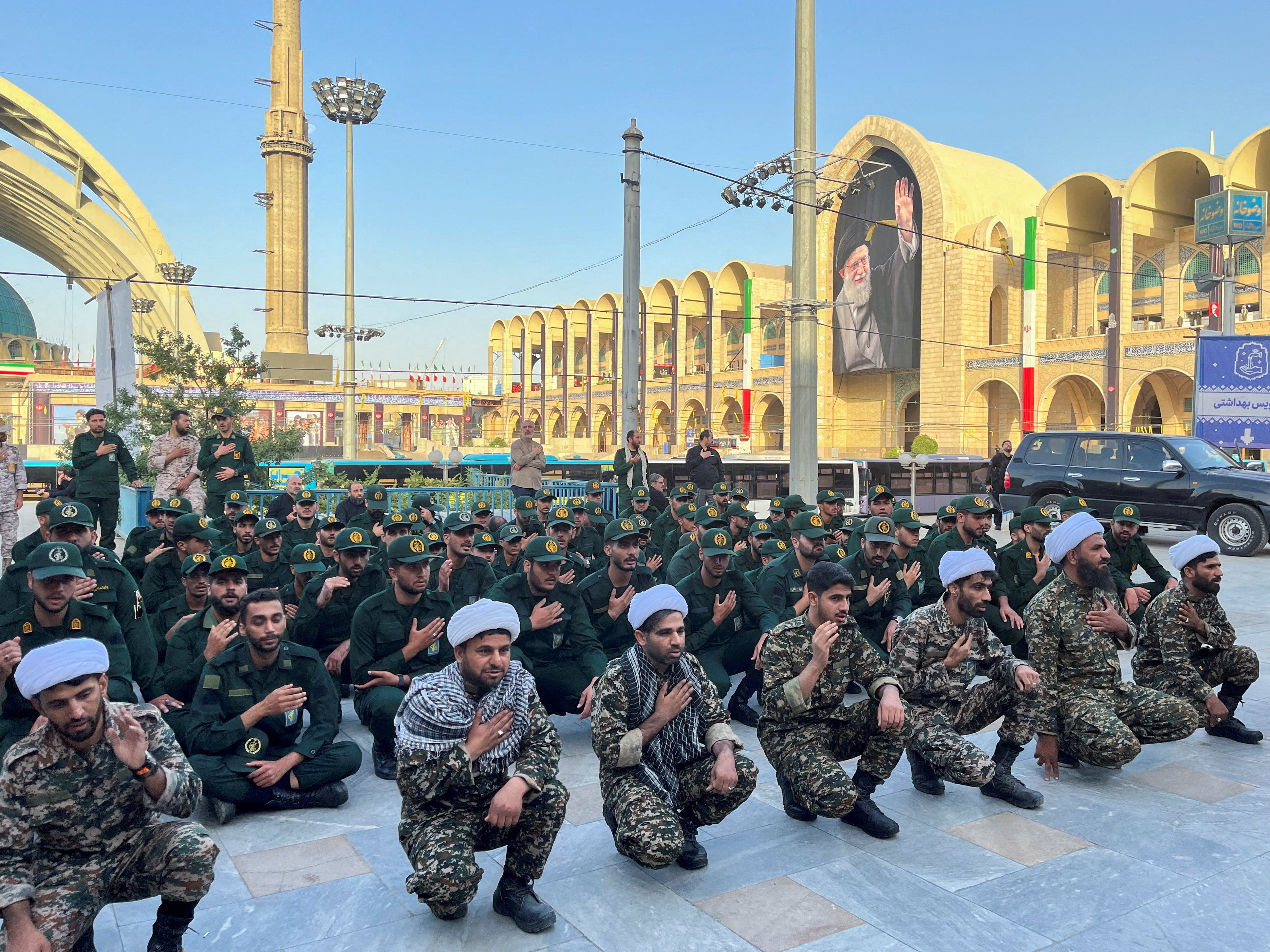 Members of the Basij paramilitary forces gather on the day international delegates participate in a farewell ceremony for Ayatollah Khamenei (Reuters)