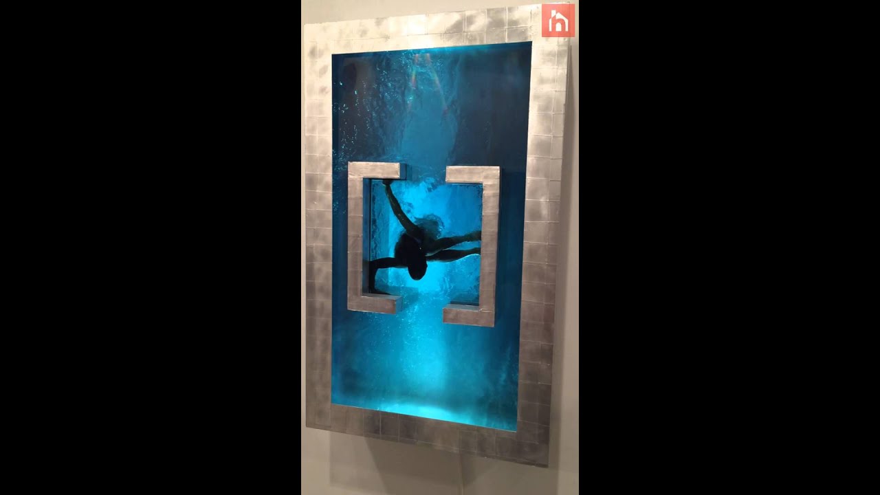 Mesmerizing kinetic art: Swimmer silhouette glides underwater in ...