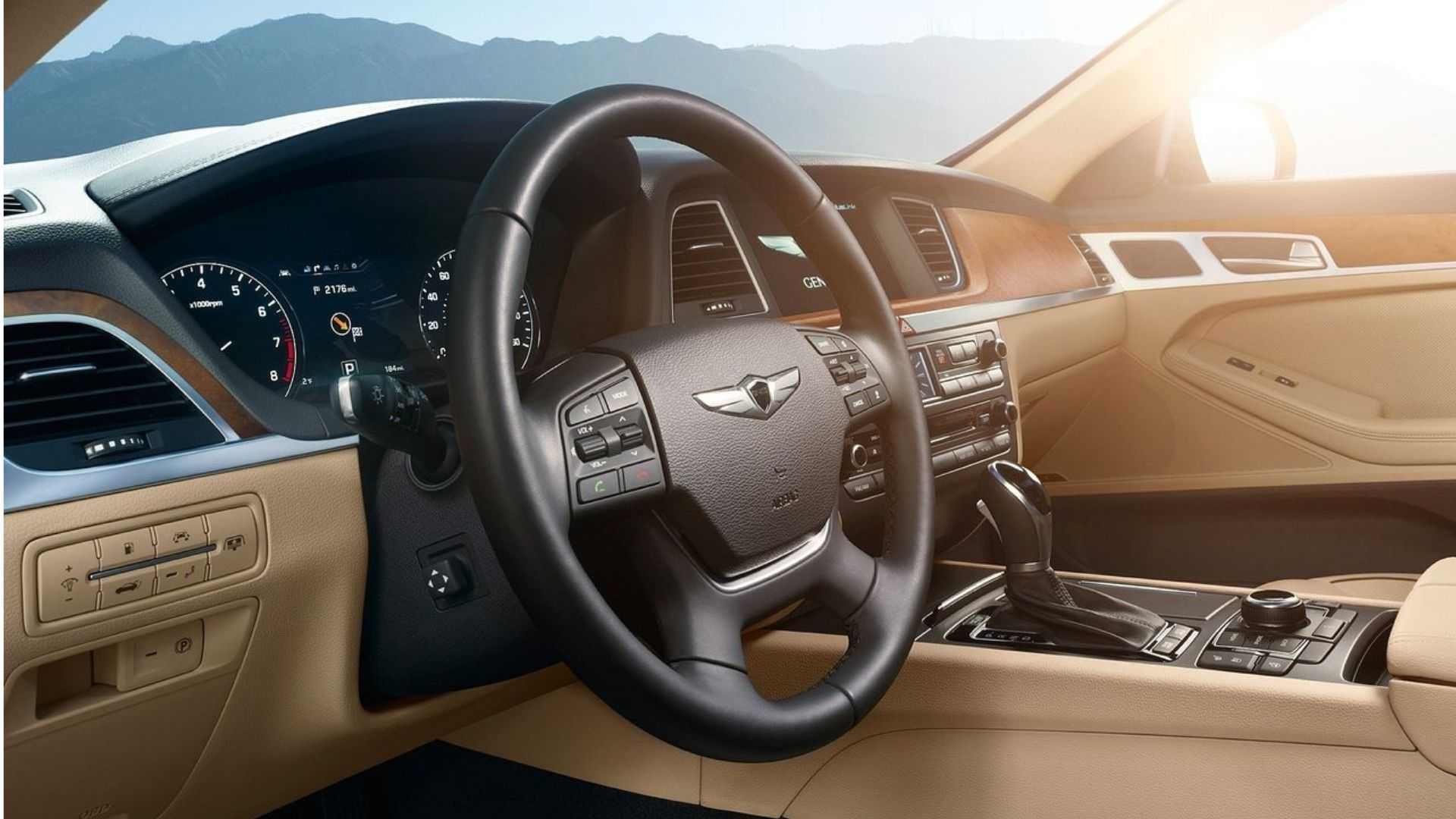 Shot of the steering wheel and dashboard in a 2017 Genesis G80.